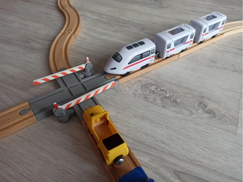 Wooden train track - Railway crossing with barrier