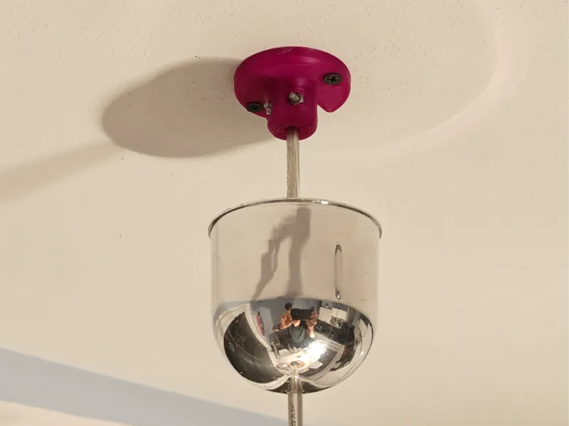 Ceiling light cable holder