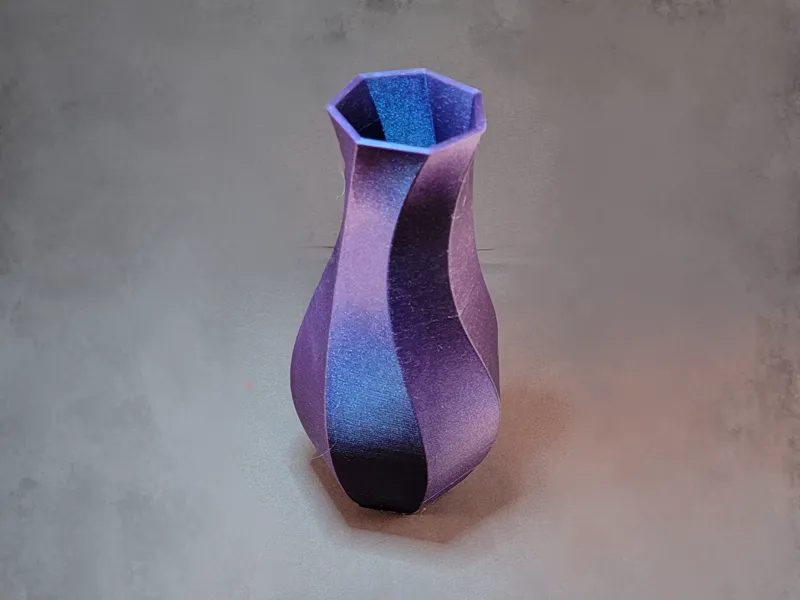 Spiral seven-sided weighted vase