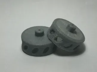 3D printed flywheels for blasters