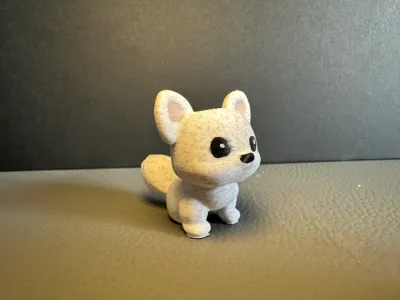 A cute little white dog ornament, pre-punched for keychains. Very cute, designed and created by BD4XBW