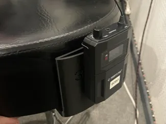 In ear holder for drum throne