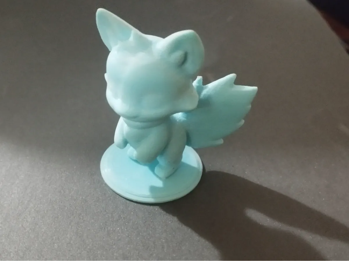 Figurine louveteau facétieux