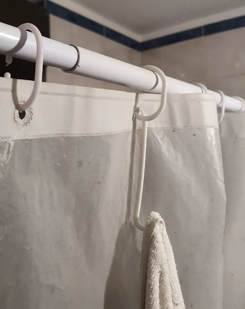Shower curtain ring with hook