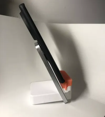 Vivo first-generation wireless charger modified for X100 using a riser