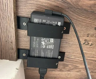 Laptop charger holder