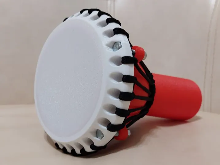 Djembe drum with membrane tensioner