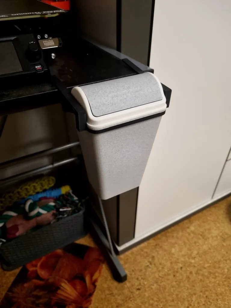 Trash can with rotating lid