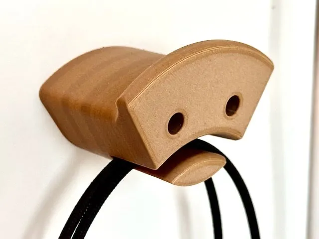 Sad headphone and cable holder