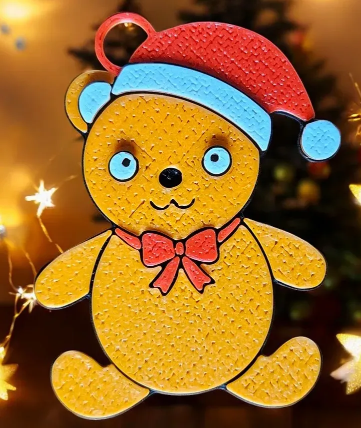 Teddy bear in a Santa hat.