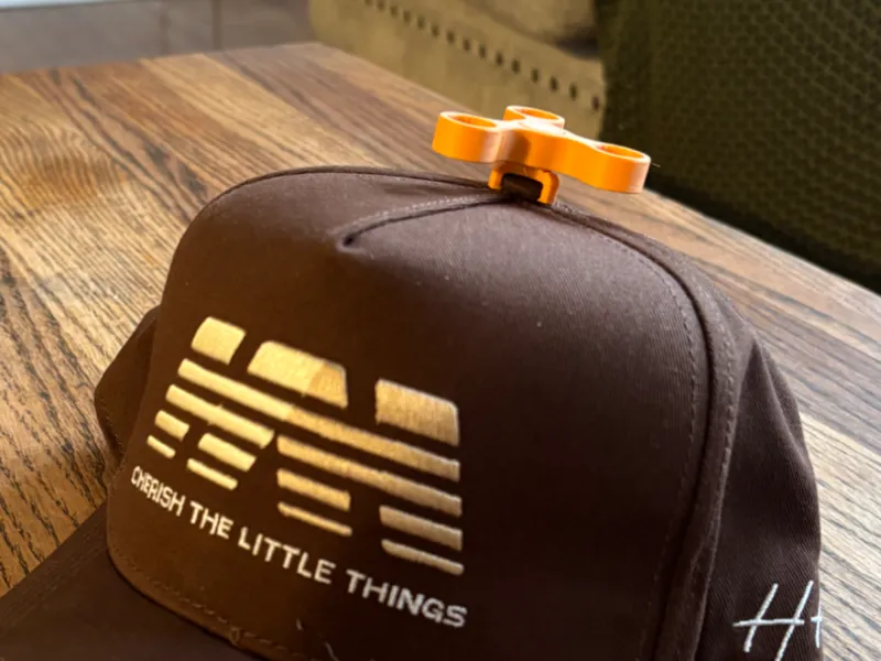 Fidget spinner hat topper