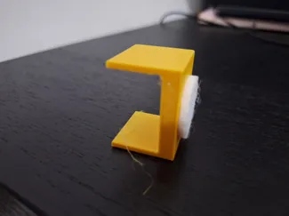 Desk wall spacer