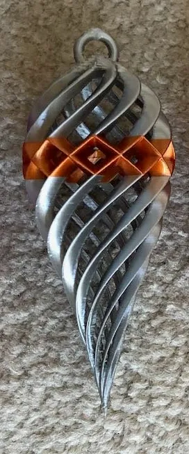 teardrop spiral ornament with criss-cross center