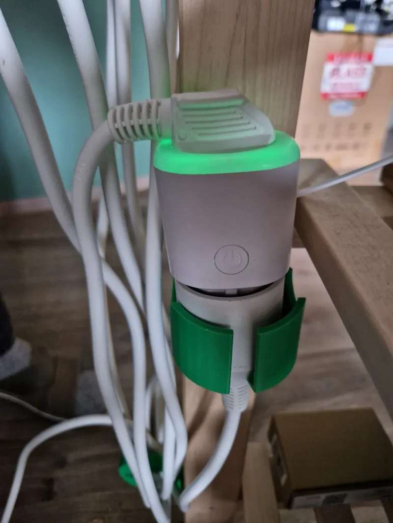 Single extension cord wall holder with holes