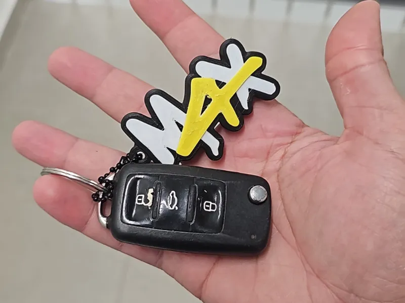 M4X Max Verstappen four-time champion keychain F1