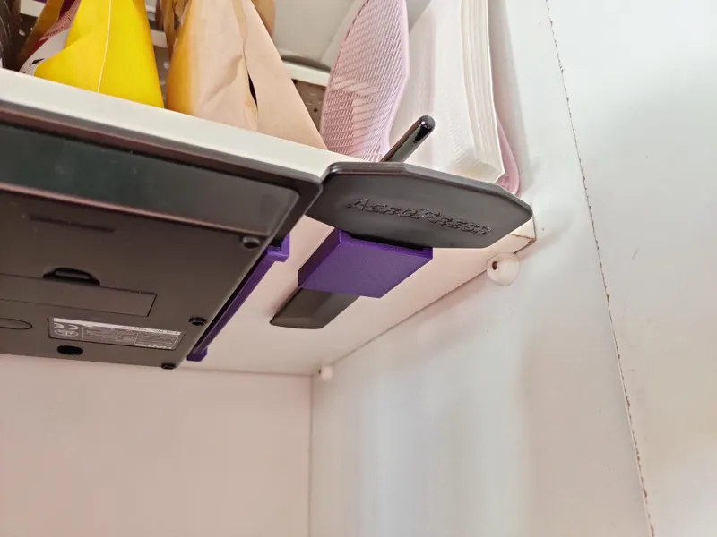 Aeropress paddle under shelf bracket
