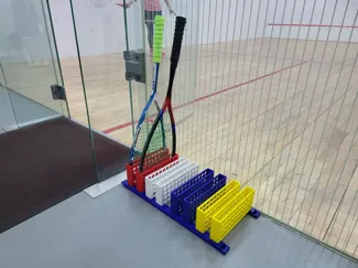 Squash racket stand