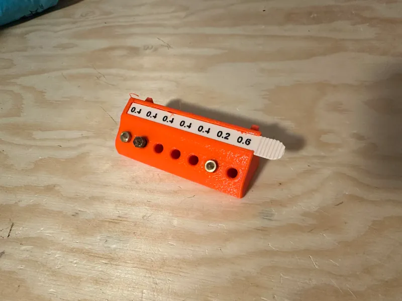 Skadis nozzle holder