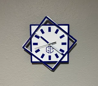 Fancy clock with square rotating frame arms