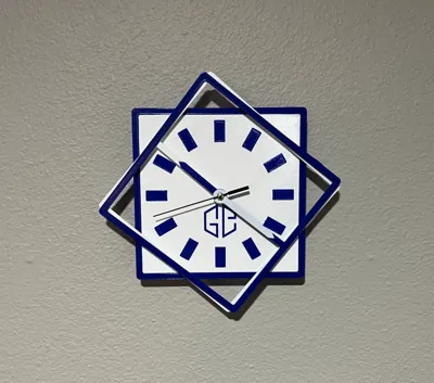 Fancy clock with square rotating frame arms