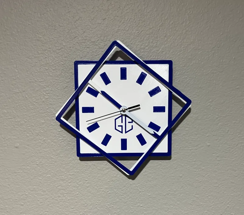 Fancy clock with square rotating frame arms