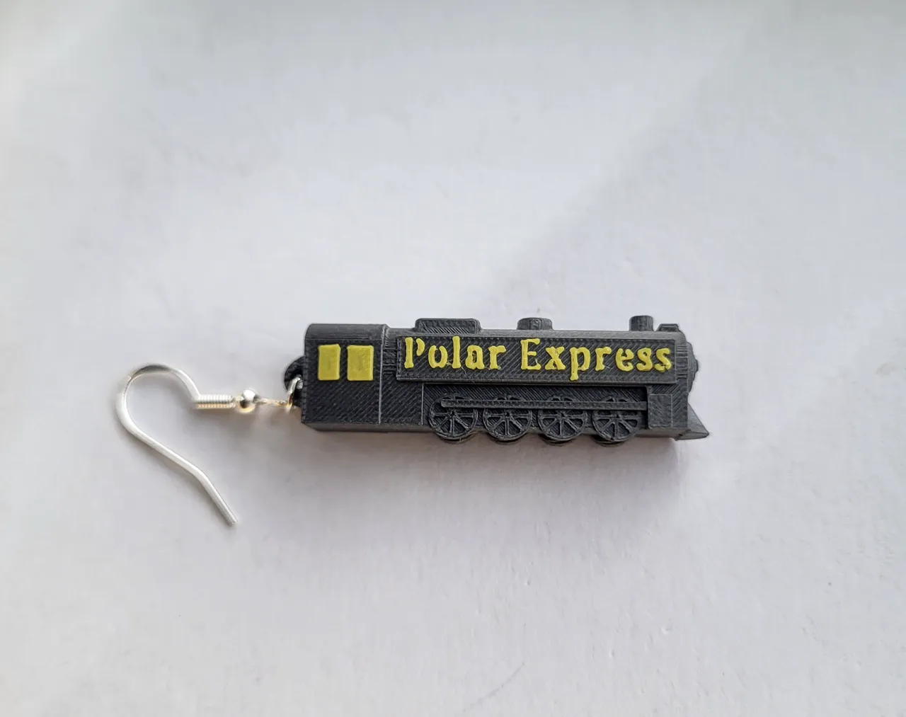 Polar Express and ticket to ride earrings view 2
