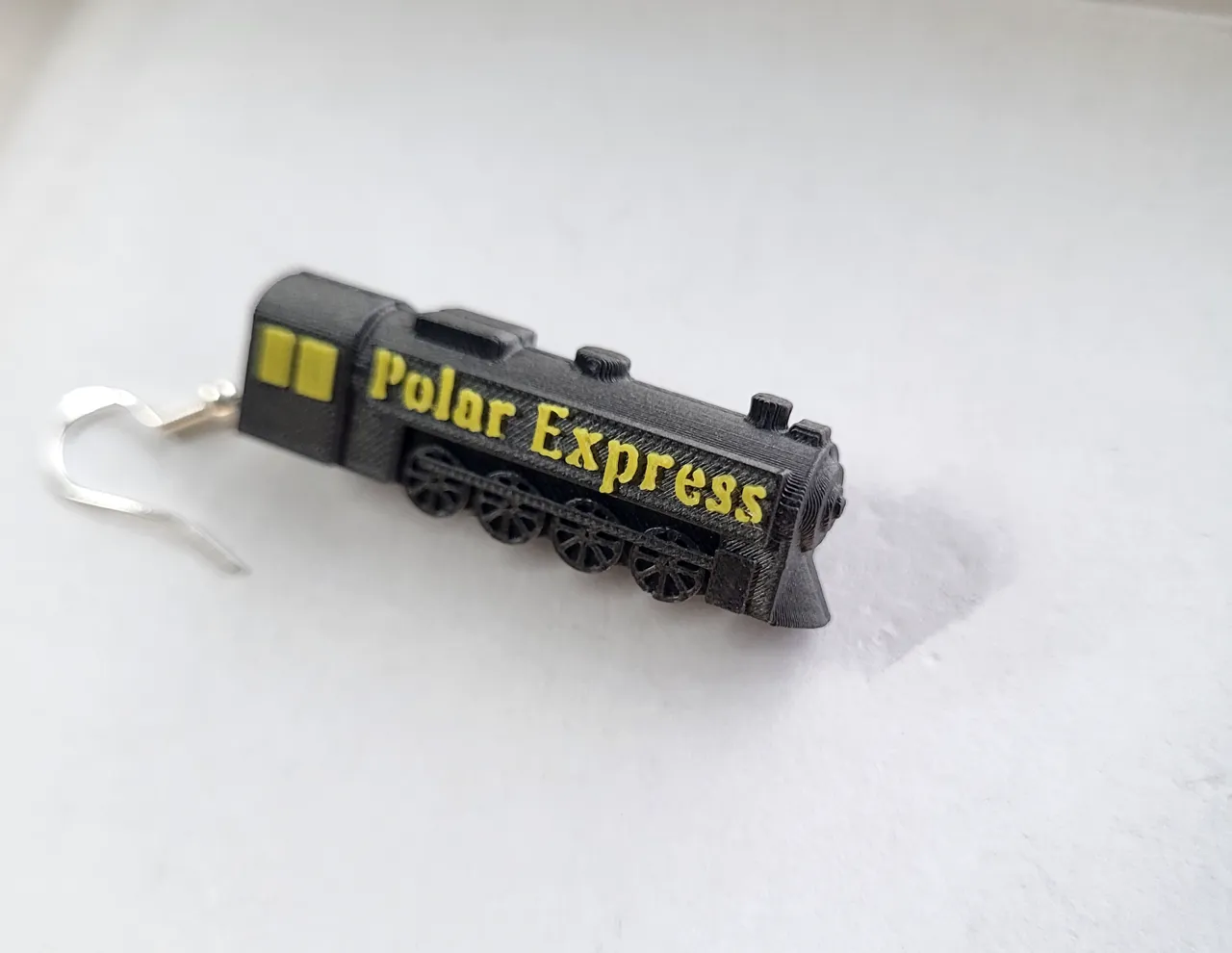 Polar Express and ticket to ride earrings view 3