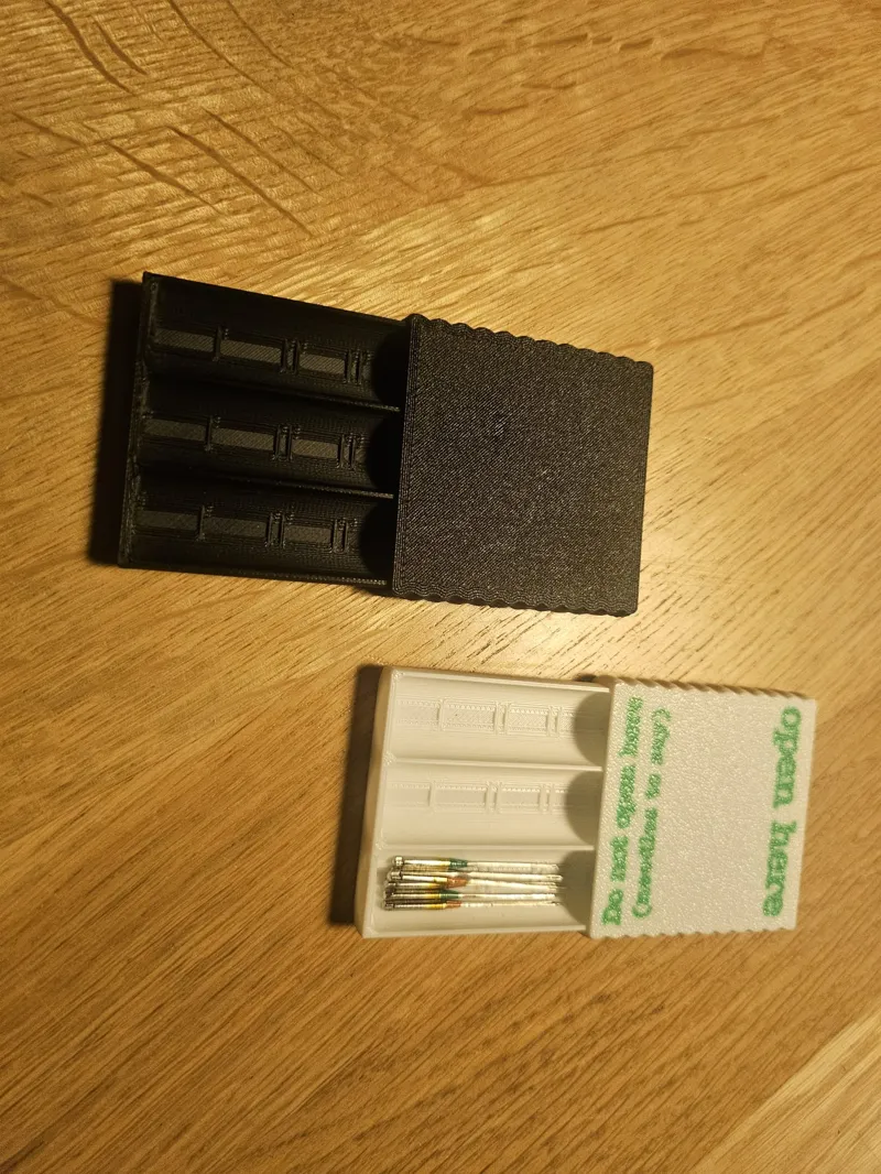 Smaller sliding needle box