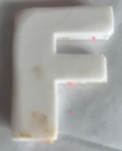 Cookie cutter in the form of a f read description 