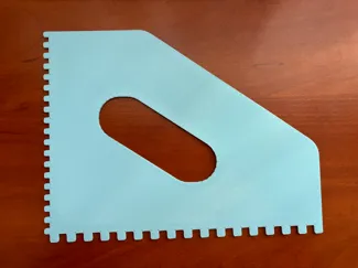 Notched spreader