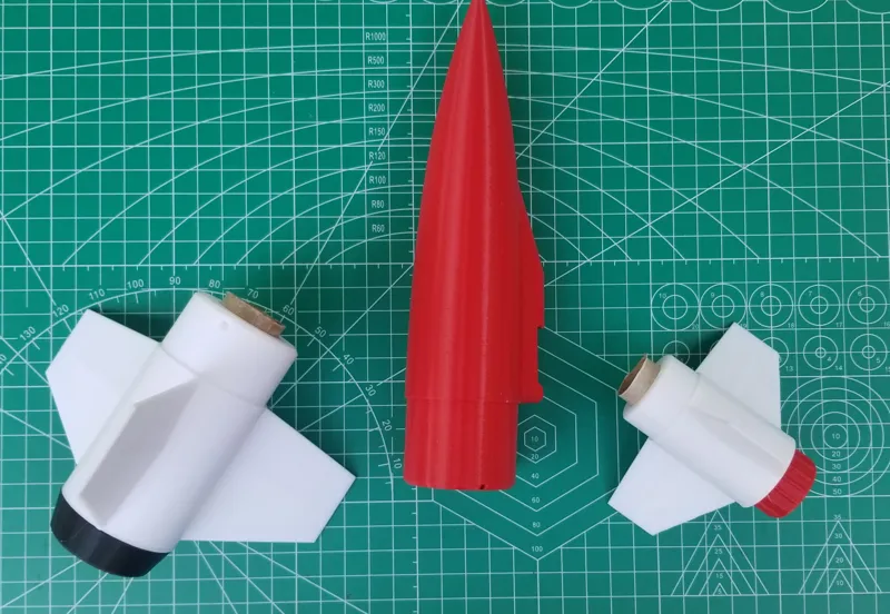 Assorted Fin Cans and Nose Cones