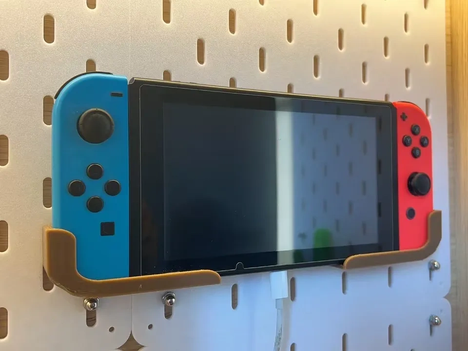 Switch stand (for 5mm thick IKEA pegboard) Remixed by Eika - MakerWorld