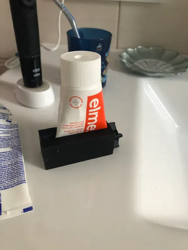 Presse-tube de dentifrice