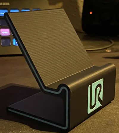 Phone stand with accent