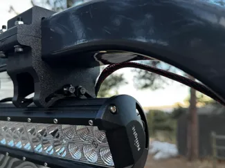 Bobcat tractor ROPS light bracket