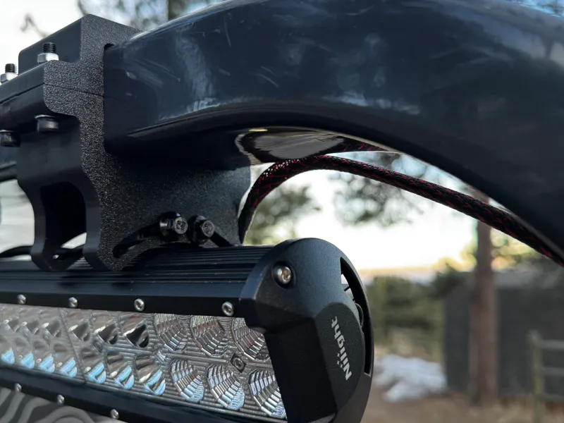 Bobcat tractor ROPS light bracket