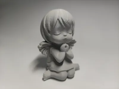 A devoutly praying angel girl