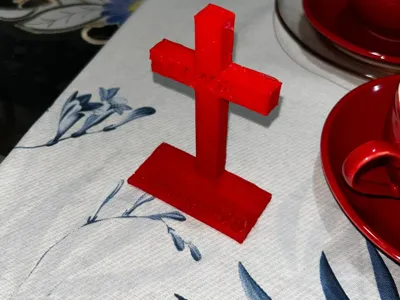 "Christ's cross with the word 'love'"