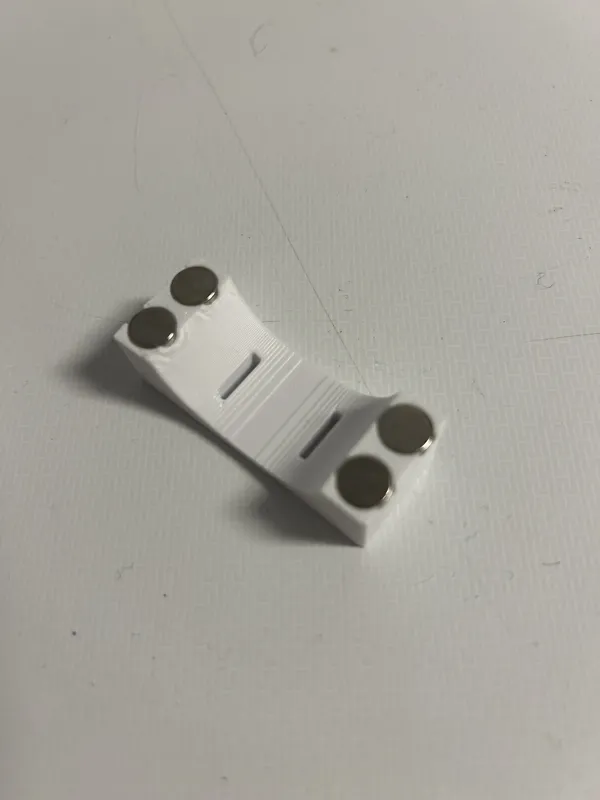 Cable holder with magnets and velcro cable ties