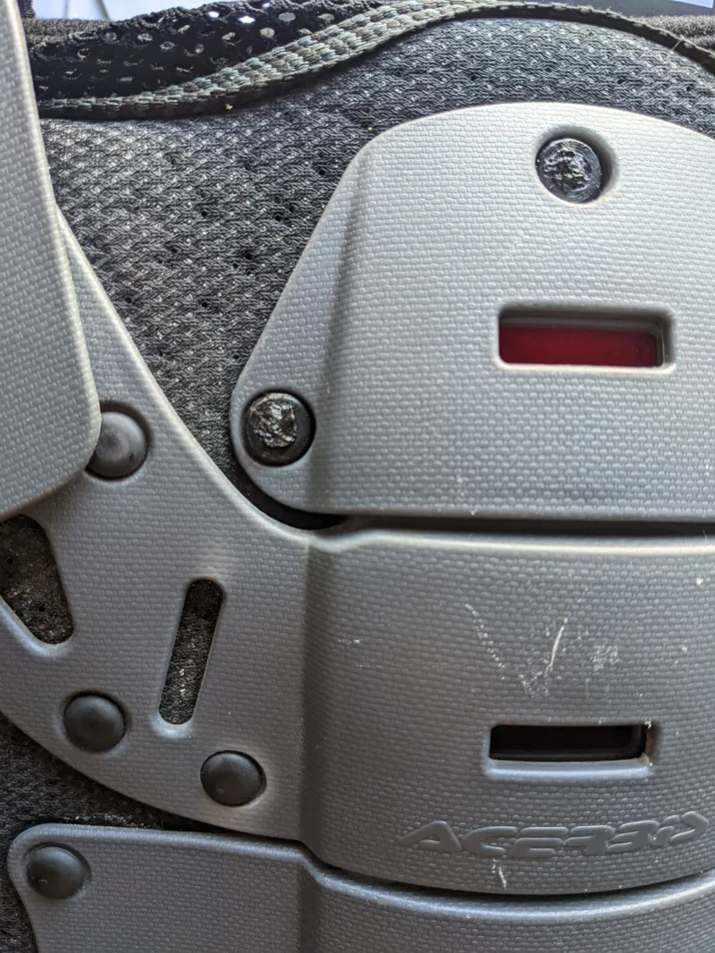 Bolt and nut for repairing an Acerbis Koerta armor