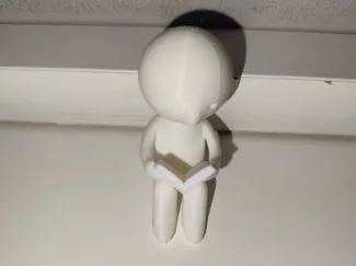 Smiski book reading figure