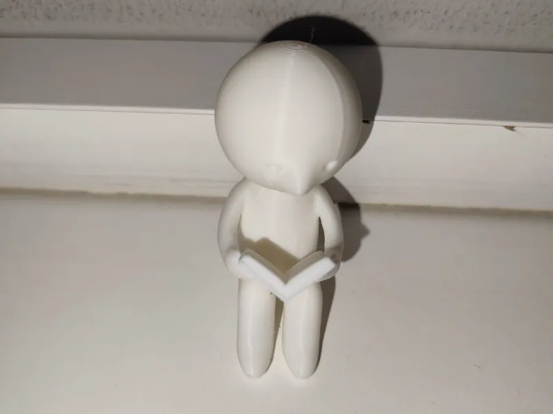 Smiski book reading figure