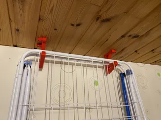 Clothes drying rack hanger