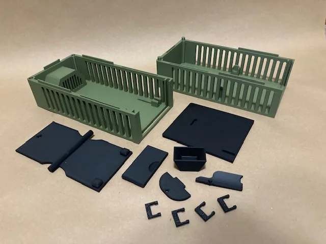 A plastic containers with parts
Description automatically generated with medium confidence