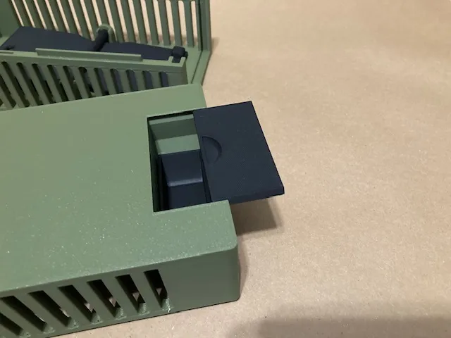 A green and black toy objects
