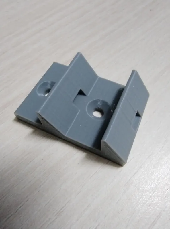 Coaxial cable wall holder