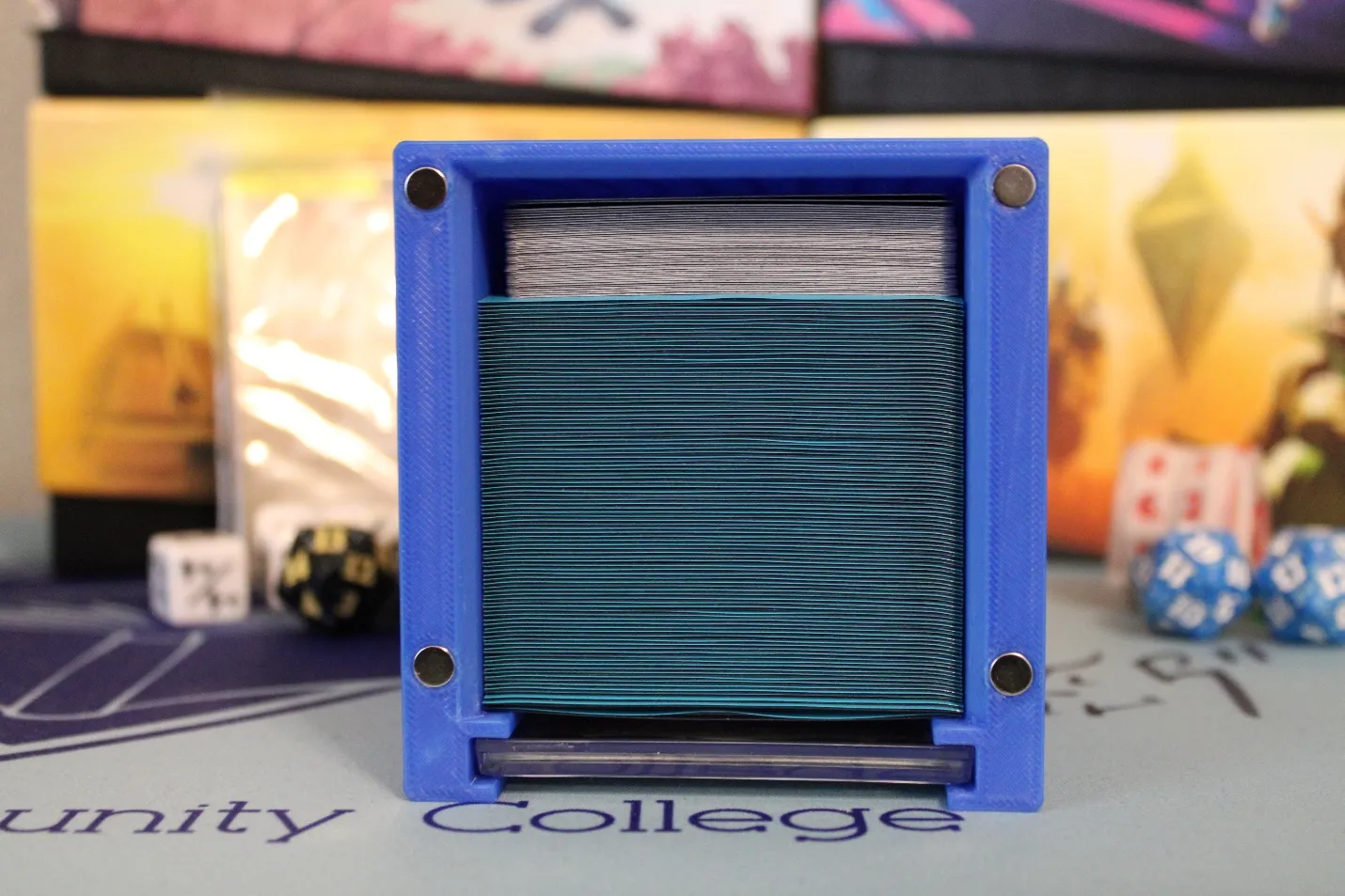 A blue square object with a blue cover
Description automatically generated with medium confidence