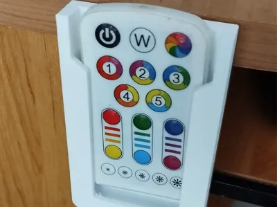 Flat remote control holder