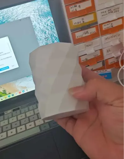 Perhaps a water cup, or maybe a small pen holder