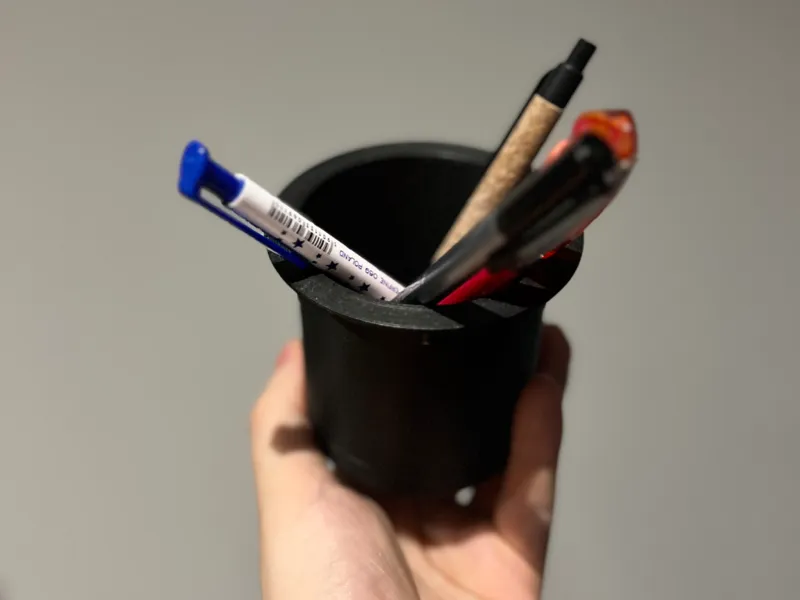 Container for desk grommet hole